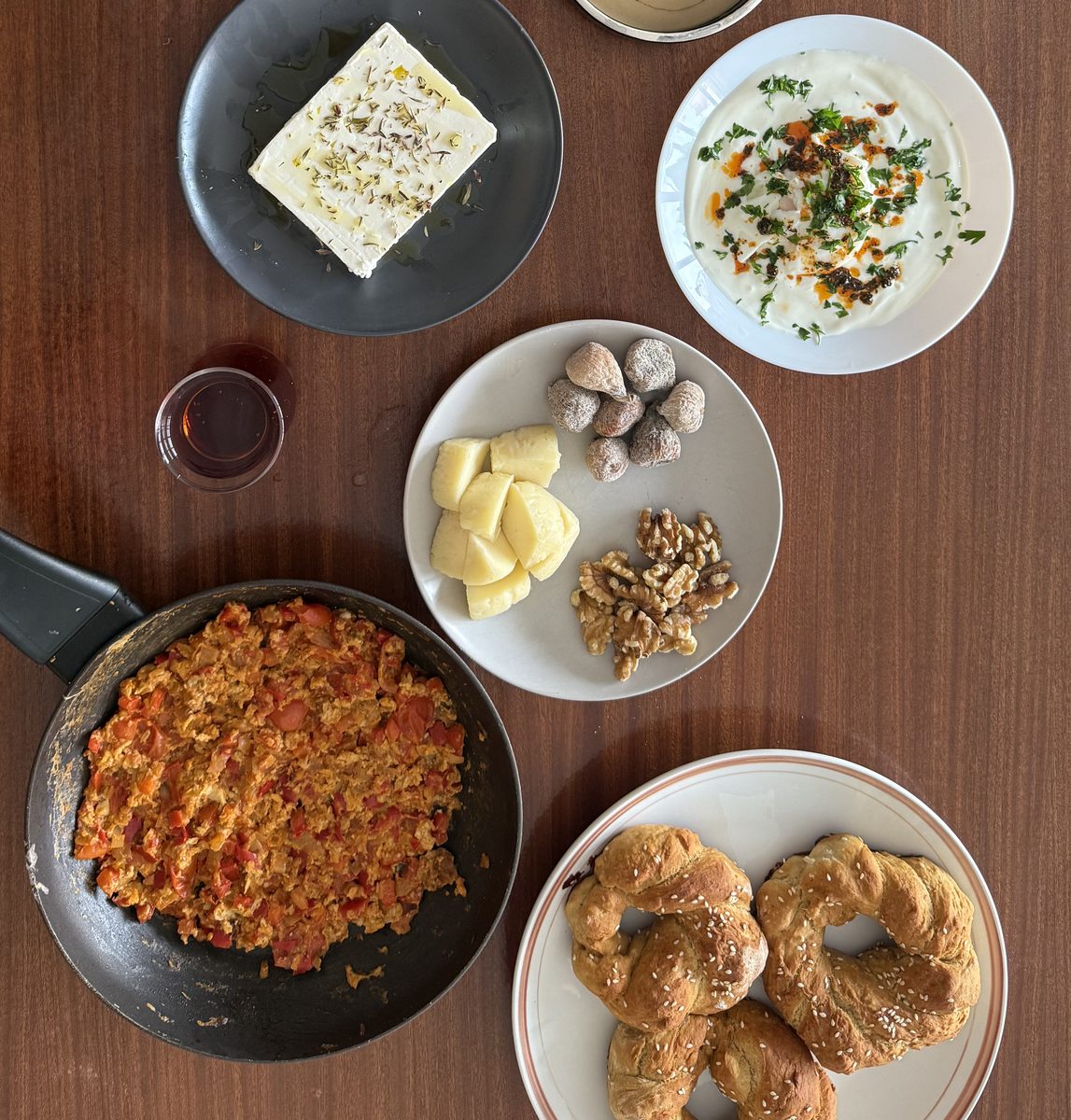 Menemen in the pan, homemade simit, white cheese and çılbır